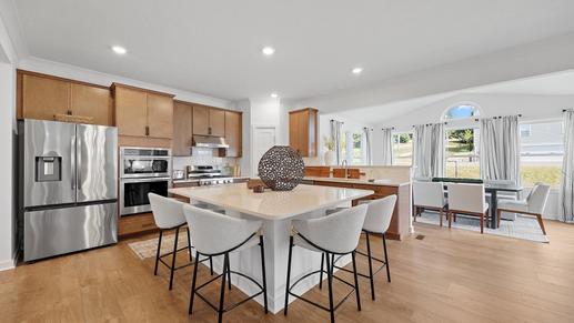 Your new kitchen will feature stainless steel appliances and a spacious island for cooking and entertaining.