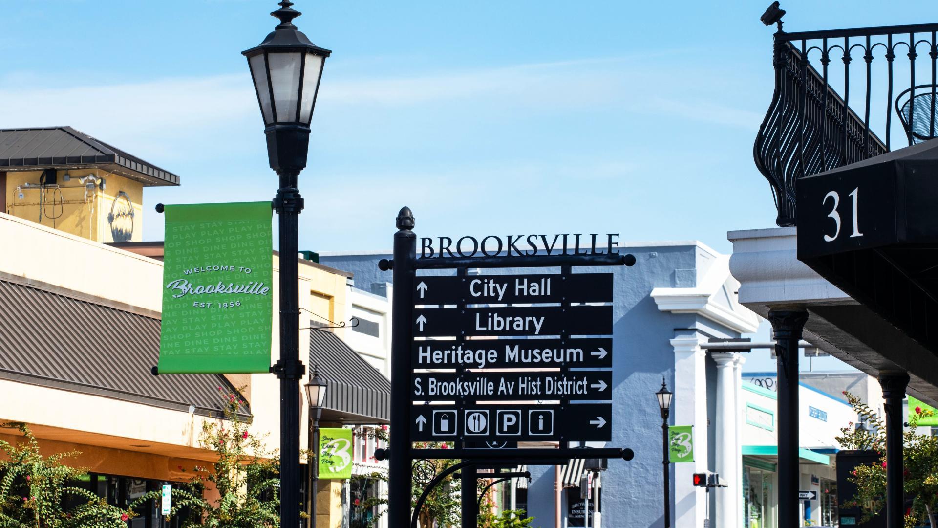 Stroll downtown to find art, history, hidden mermaids, a museum, and charming gathering spots.