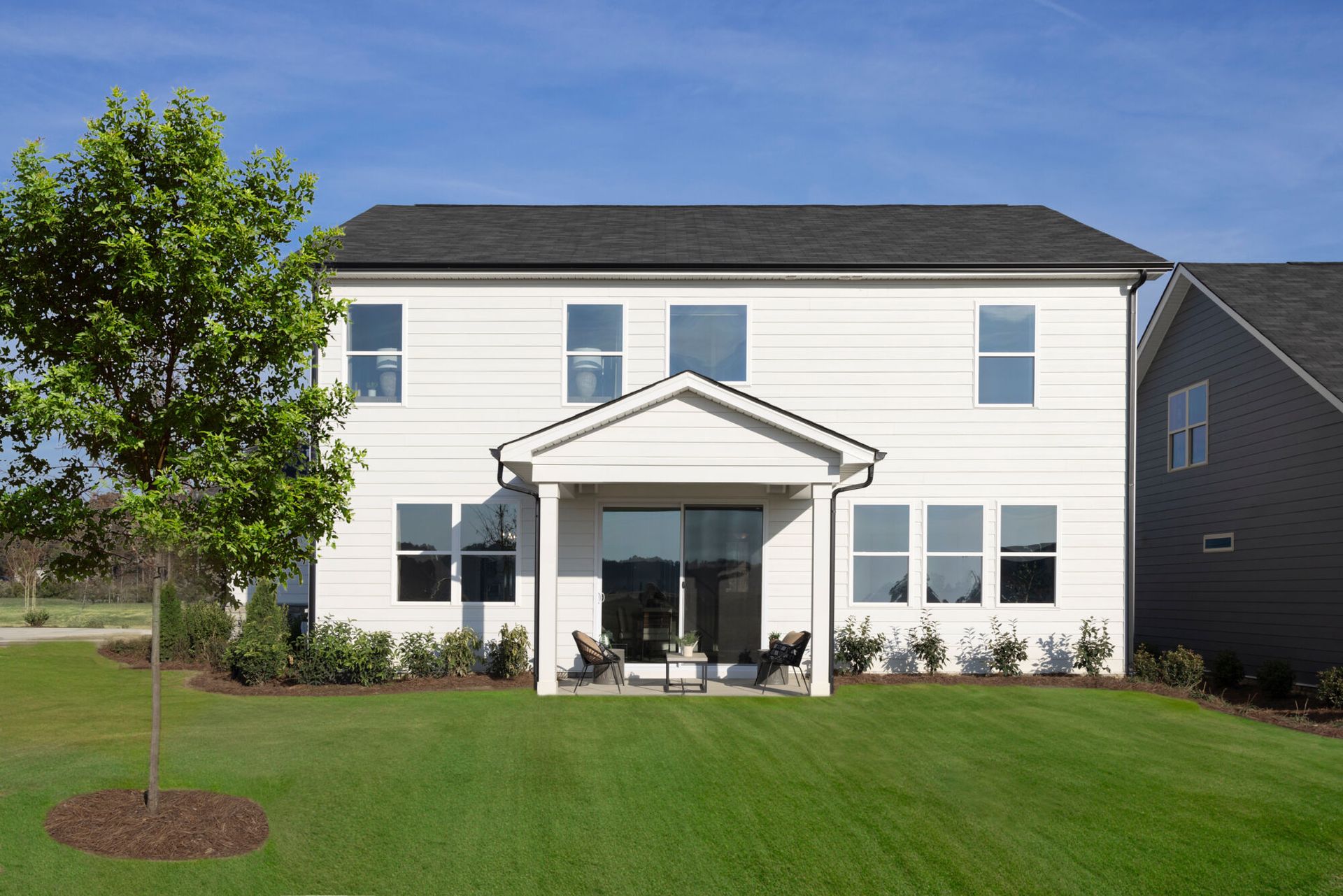 Sequoia model exterior back with covered veranda.