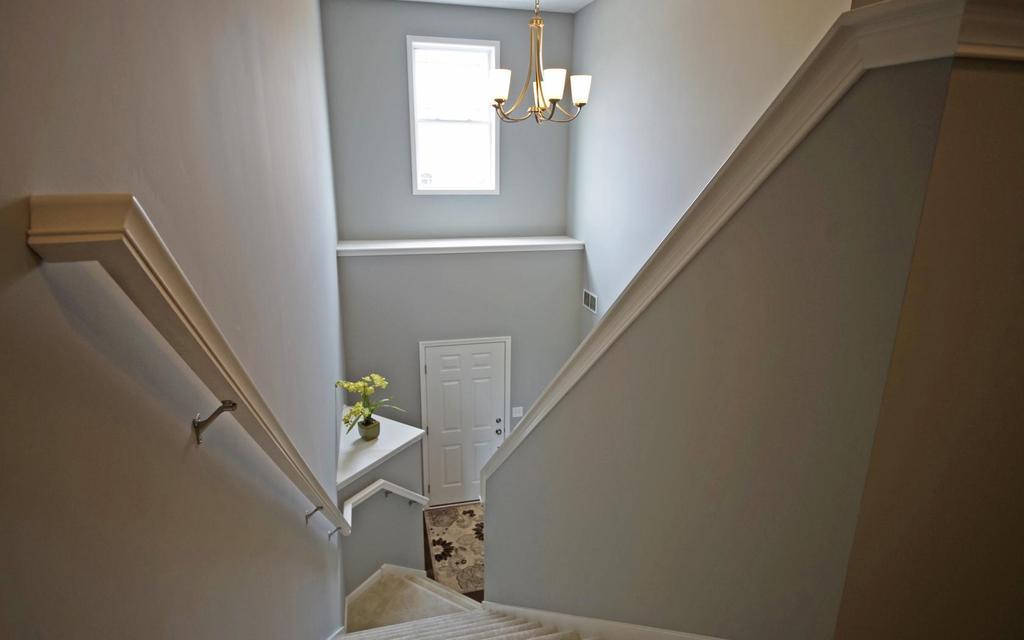 Welcome to the Waverly. This wonderful first floor master plan offers an array of possibilities. A flex room off the foyer can be either a study or an additional bedroom. The open concept of the two story Great Room to the Dining and Kitchen make it a won