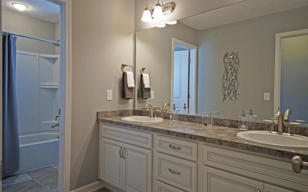 Welcome to the Waverly. This wonderful first floor master plan offers an array of possibilities. A flex room off the foyer can be either a study or an additional bedroom. The open concept of the two story Great Room to the Dining and Kitchen make it a won