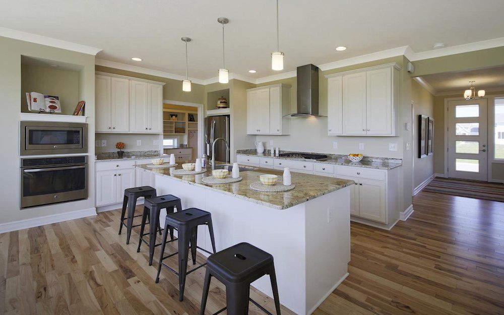 Welcome to the Newton. This home has a little bit of everything - from the first floor flex room (which can be a den or a bedroom) to the spacious Great Room, to the oversized dining area and well appointed kitchen, you will find it offers just what you n