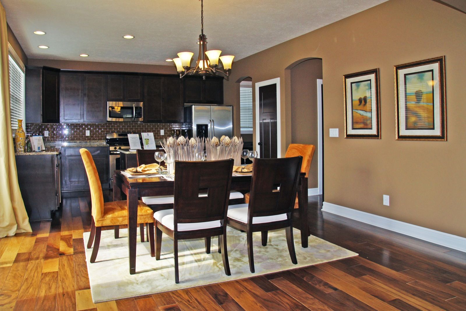 Welcome to the Nantucket. This is a WOW home - at every turn. The foyer leads to the first floor study and on to the wide open Great Room, dining, and kitchen areas - all graced with plenty of glass! A drop zone and Command Center off of the kitchen help 