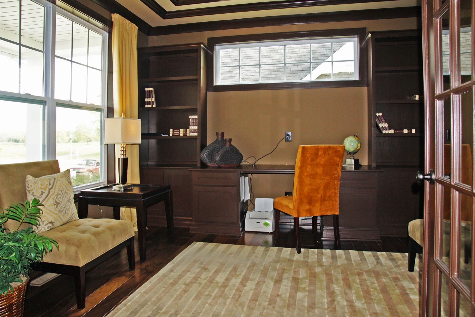 Welcome to the Nantucket. This is a WOW home - at every turn. The foyer leads to the first floor study and on to the wide open Great Room, dining, and kitchen areas - all graced with plenty of glass! A drop zone and Command Center off of the kitchen help 