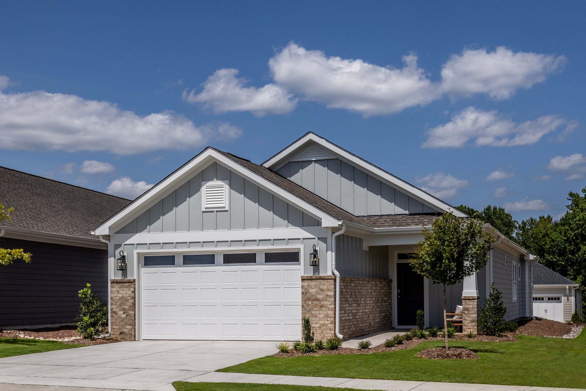 casa en The Walk at East Village por McKee Homes