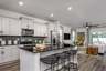 casa en Coastal Haven Townhomes por McKee Homes