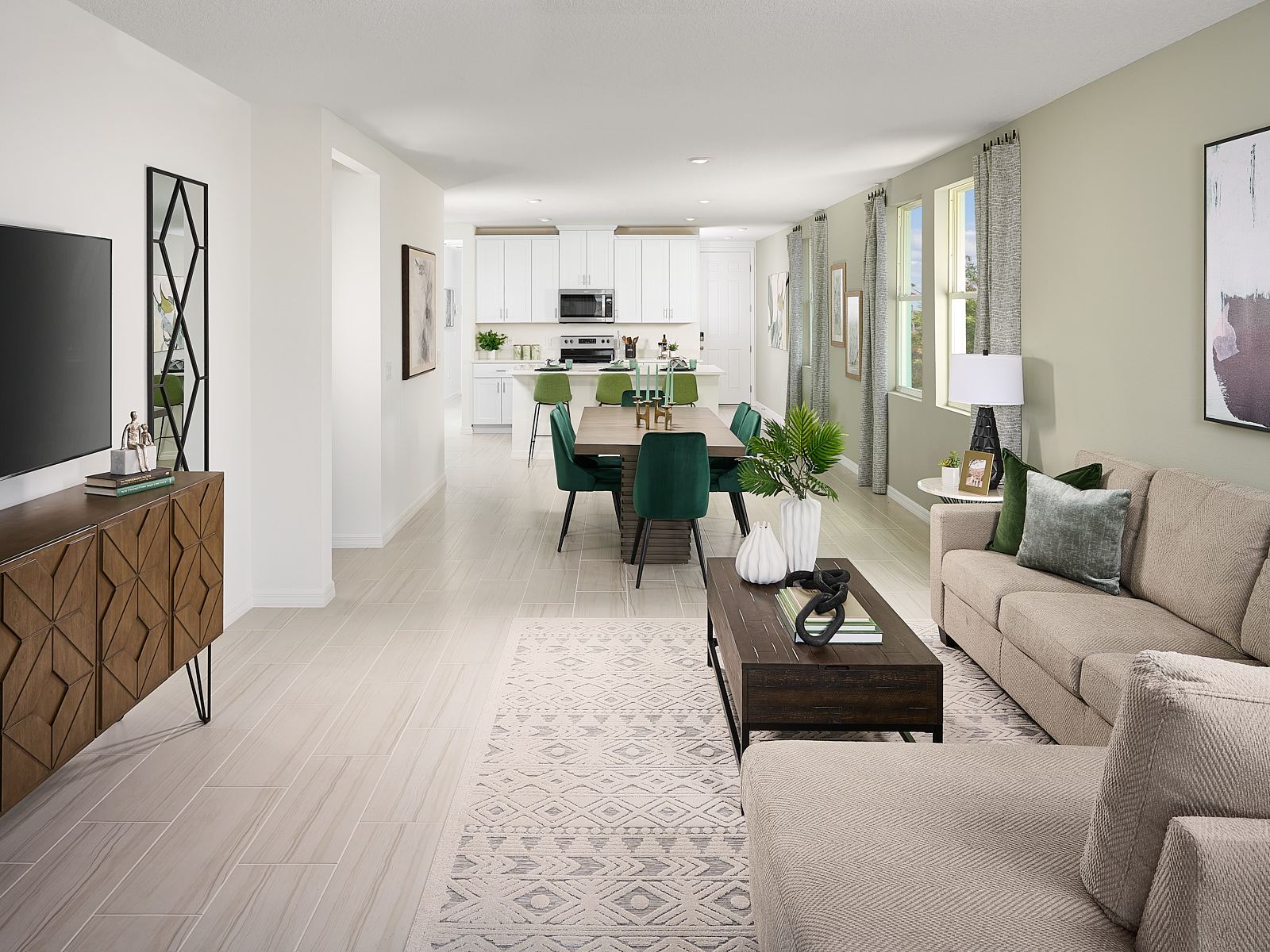 Great room in Acadia floorplan modeled at Lake Deer Estates