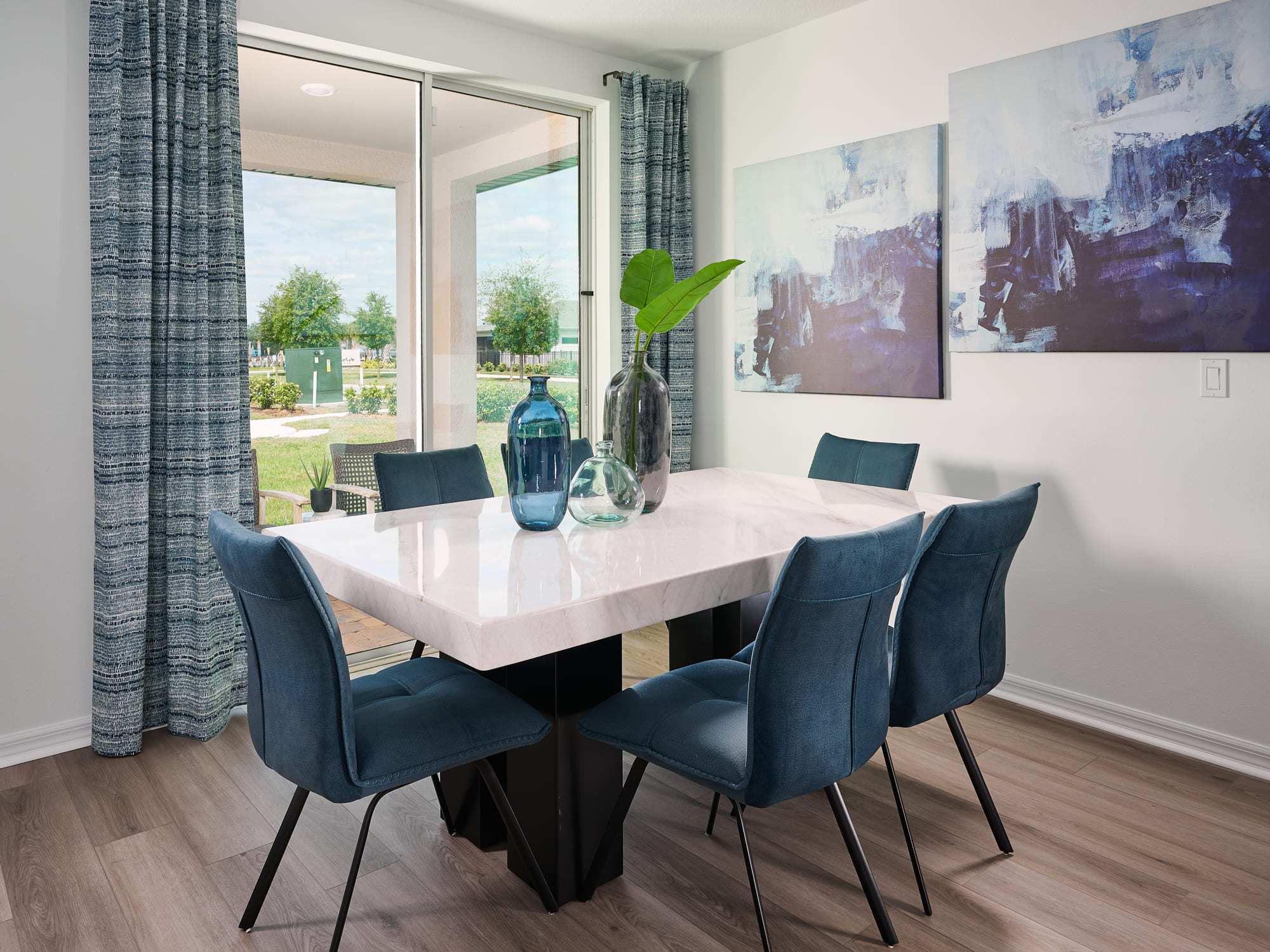 Dining room in Hibiscus floorplan modeled at The Reserve at Twin Lakes
