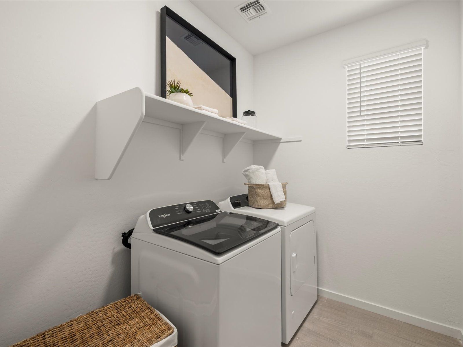 Laundry room in Leslie floorplan at Teravalis