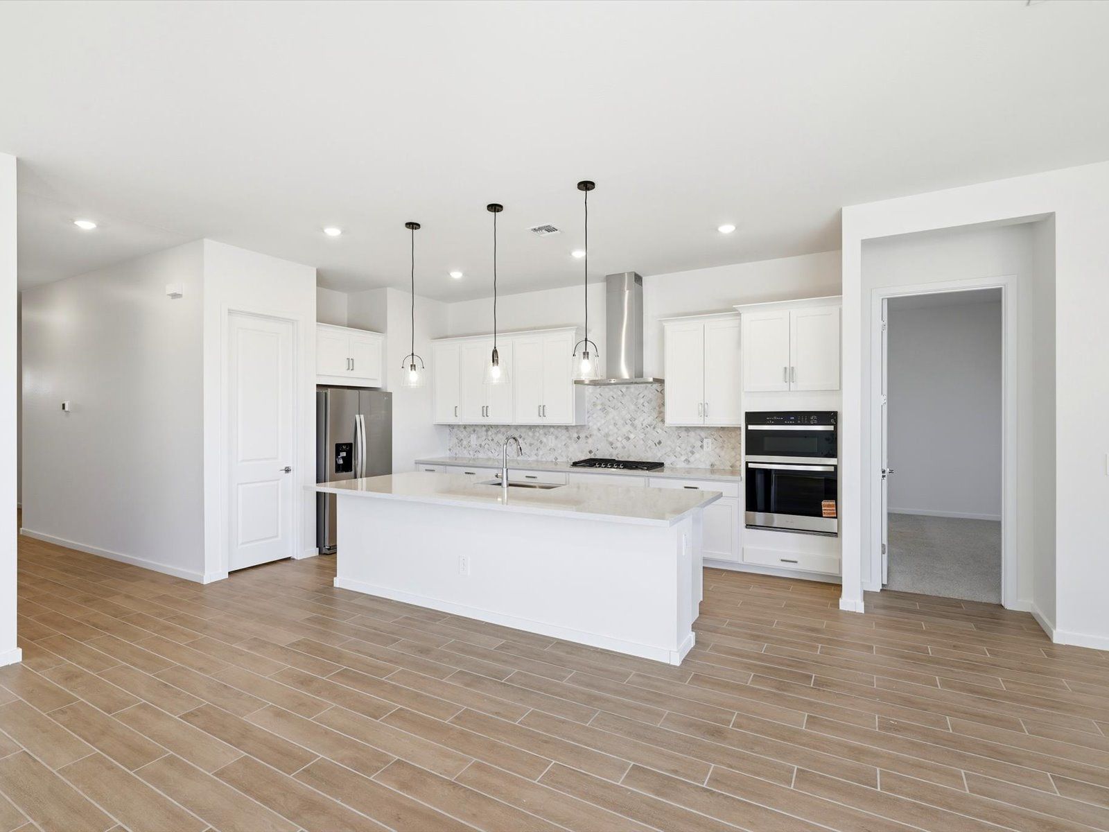 The Amber floorplan interior photo taken at a Meritage Homes community in Goodyear, AZ.
