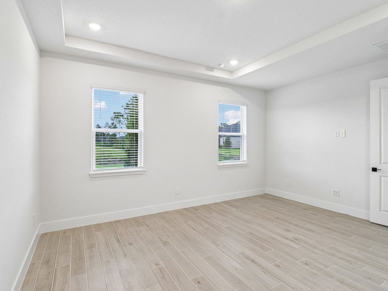 Primary bedroom in the Coral floorplan