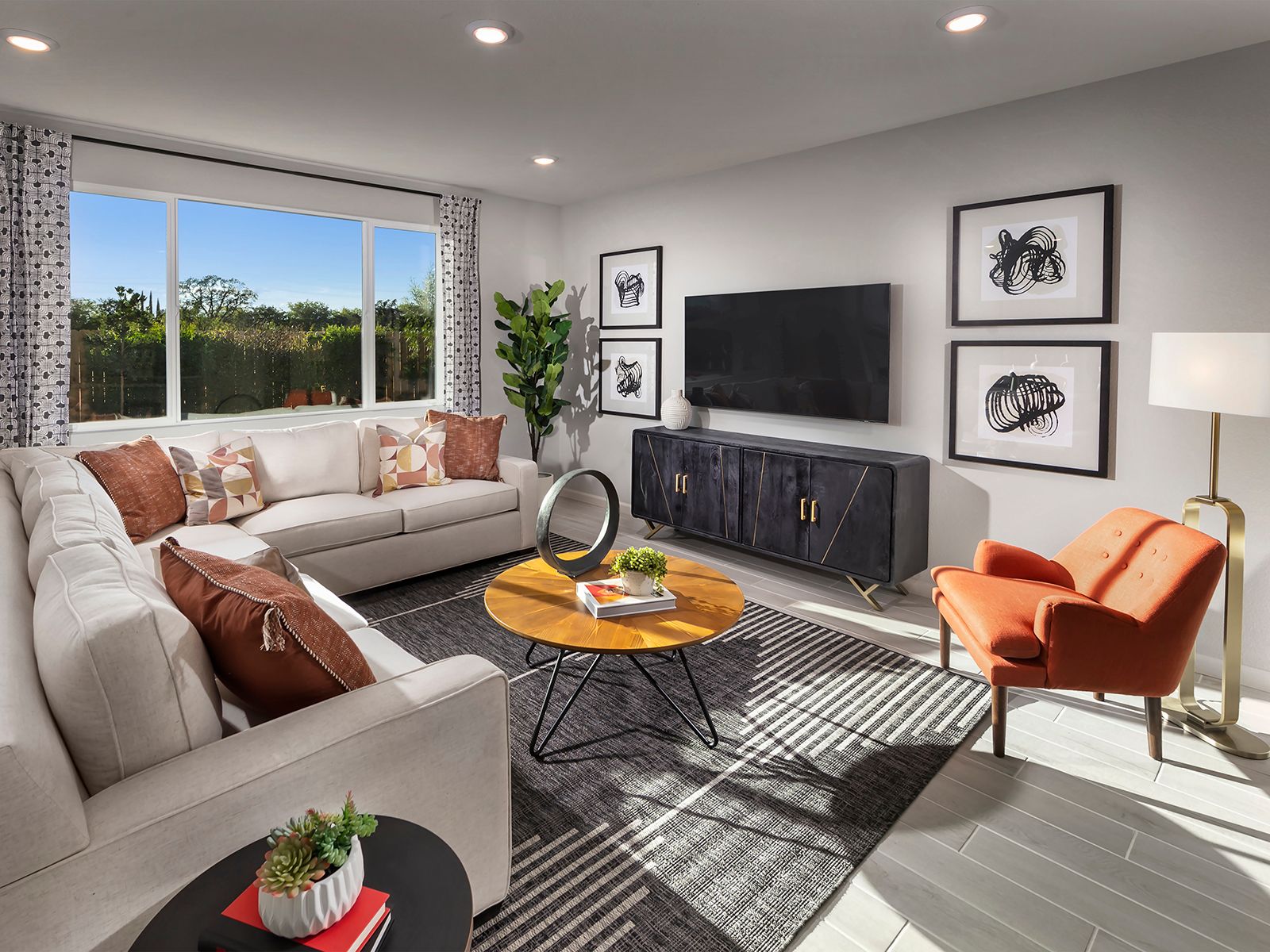 Residence 3 living room modeled at a nearby Meritage community.
