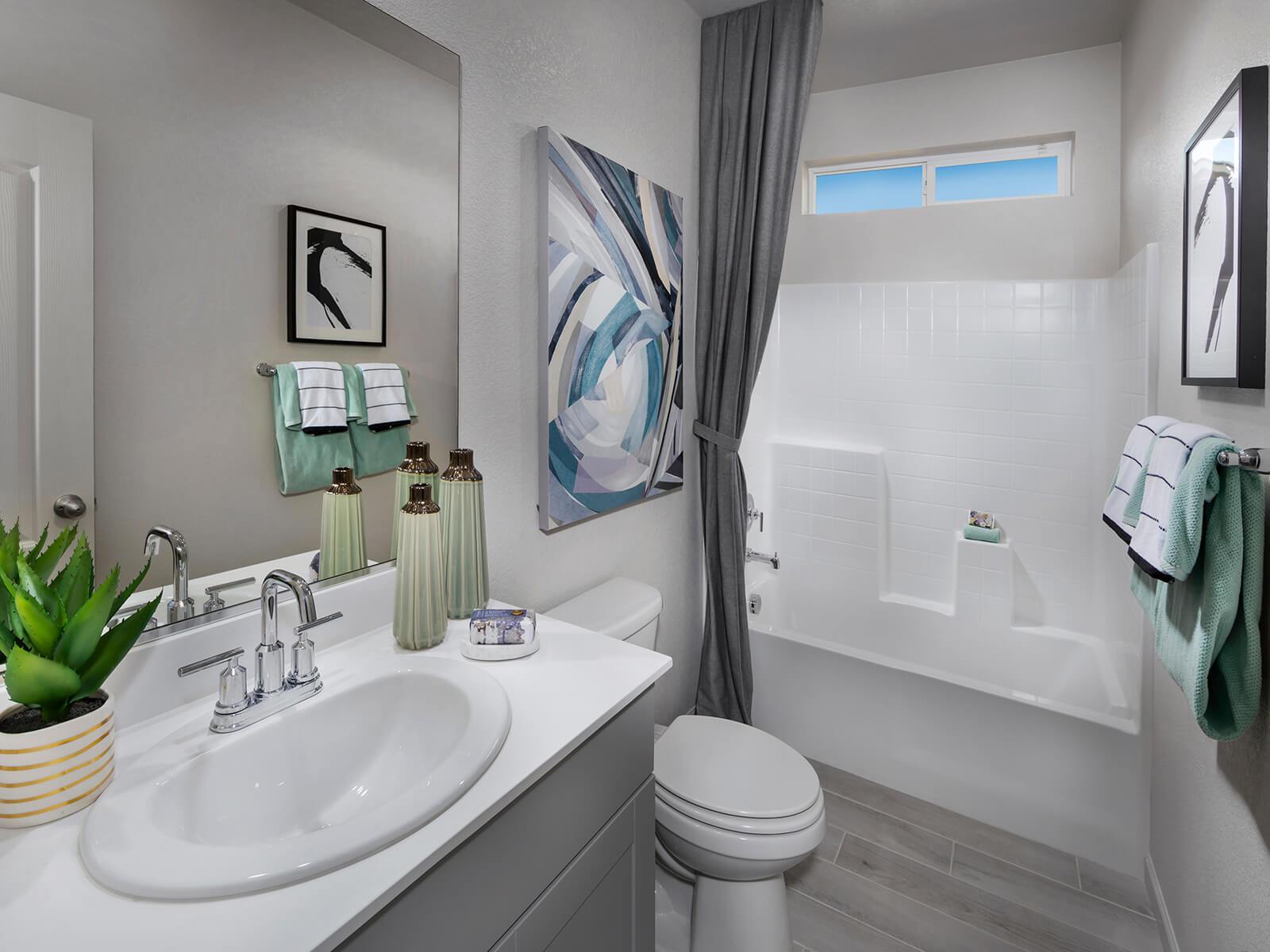 Residence 1 secondary bathroom modeled at a nearby Meritage community.