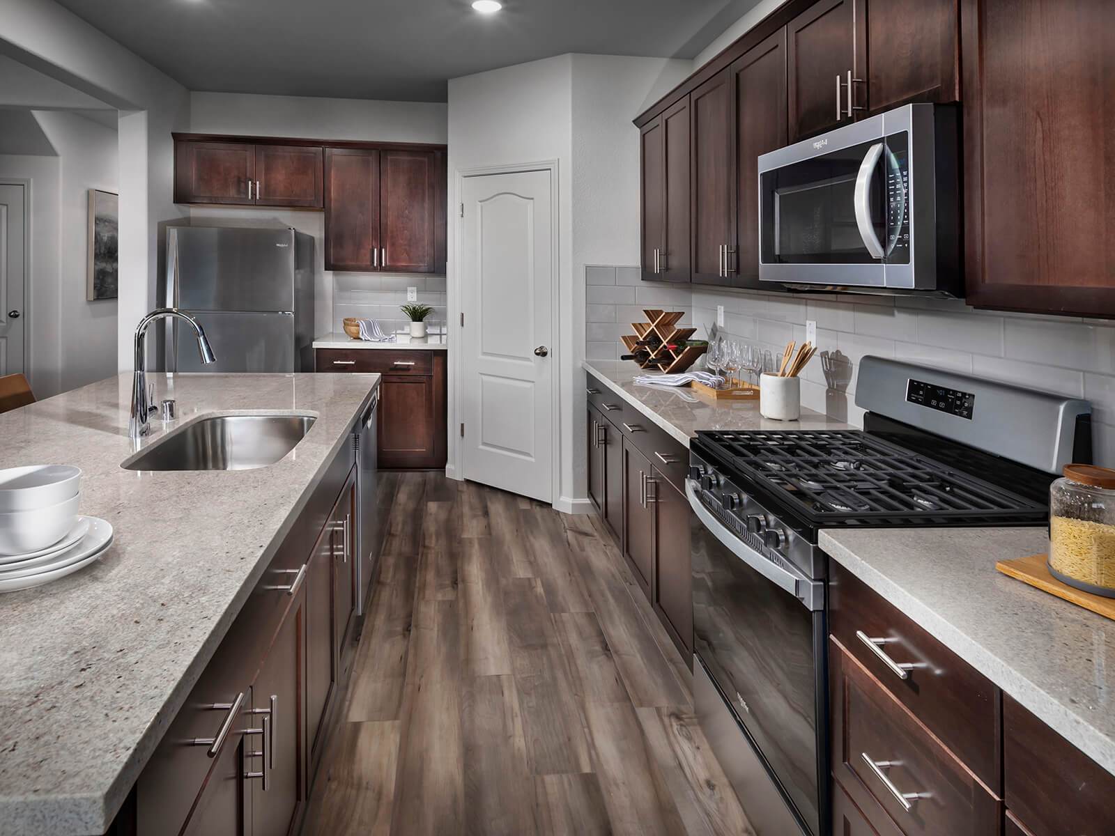 Residence 2 kitchen modeled at a nearby Meritage community.