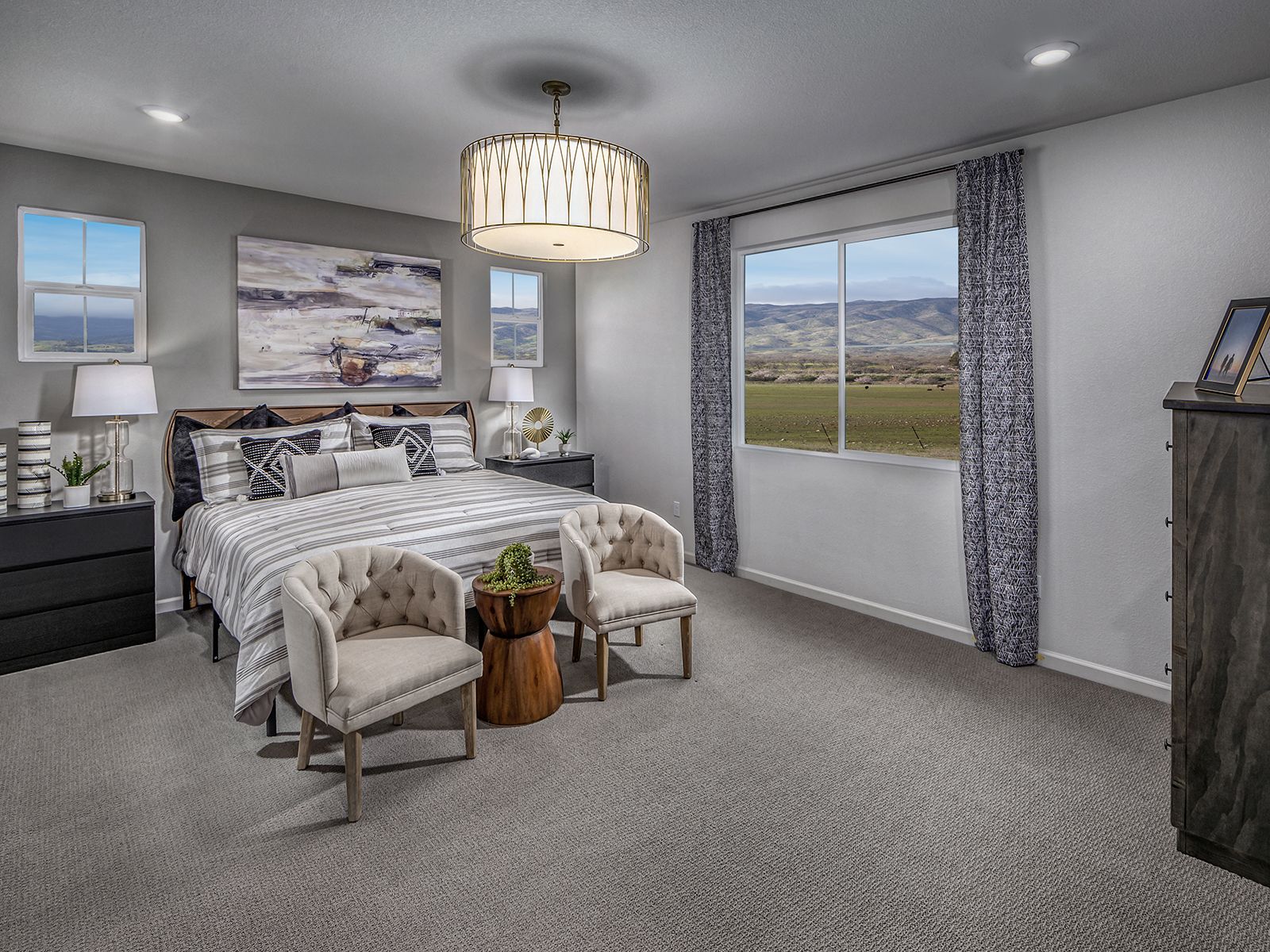 Residence 4 primary suite modeled at a nearby Meritage community.