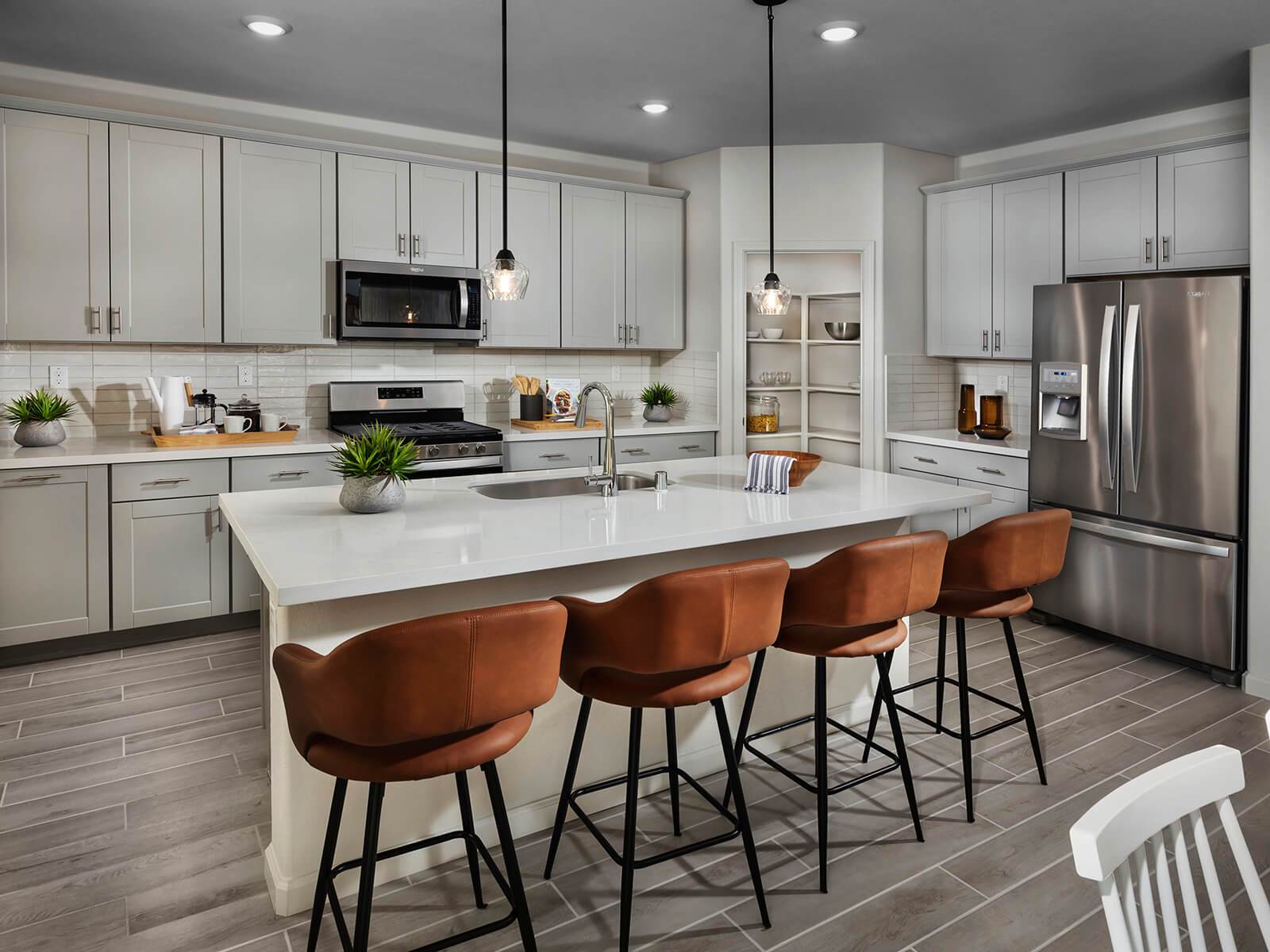 Residence 1 kitchen modeled at a nearby Meritage community.