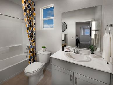 Spacious bathrooms make mornings a little easier.