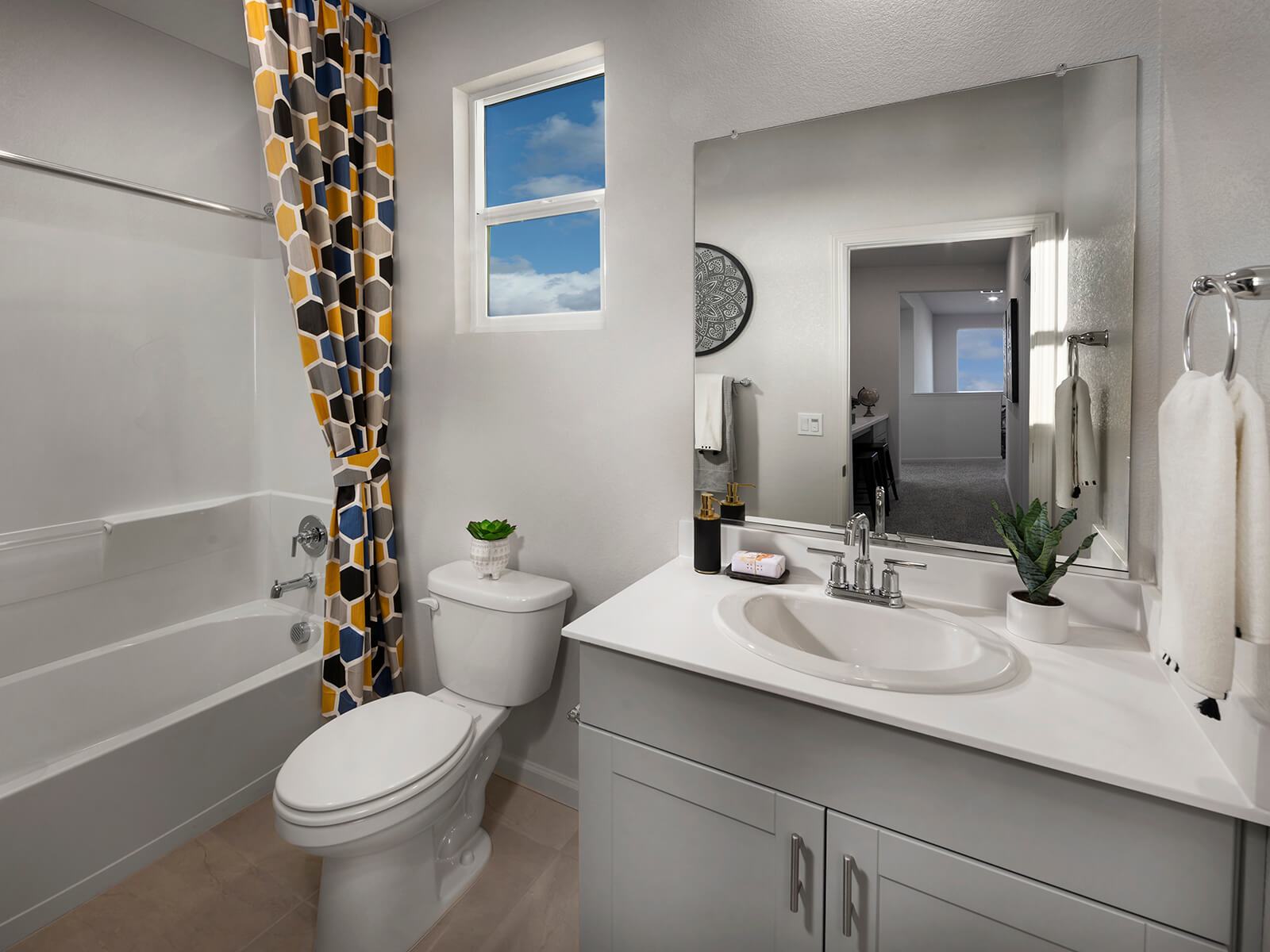 Spacious bathrooms make mornings a little easier.