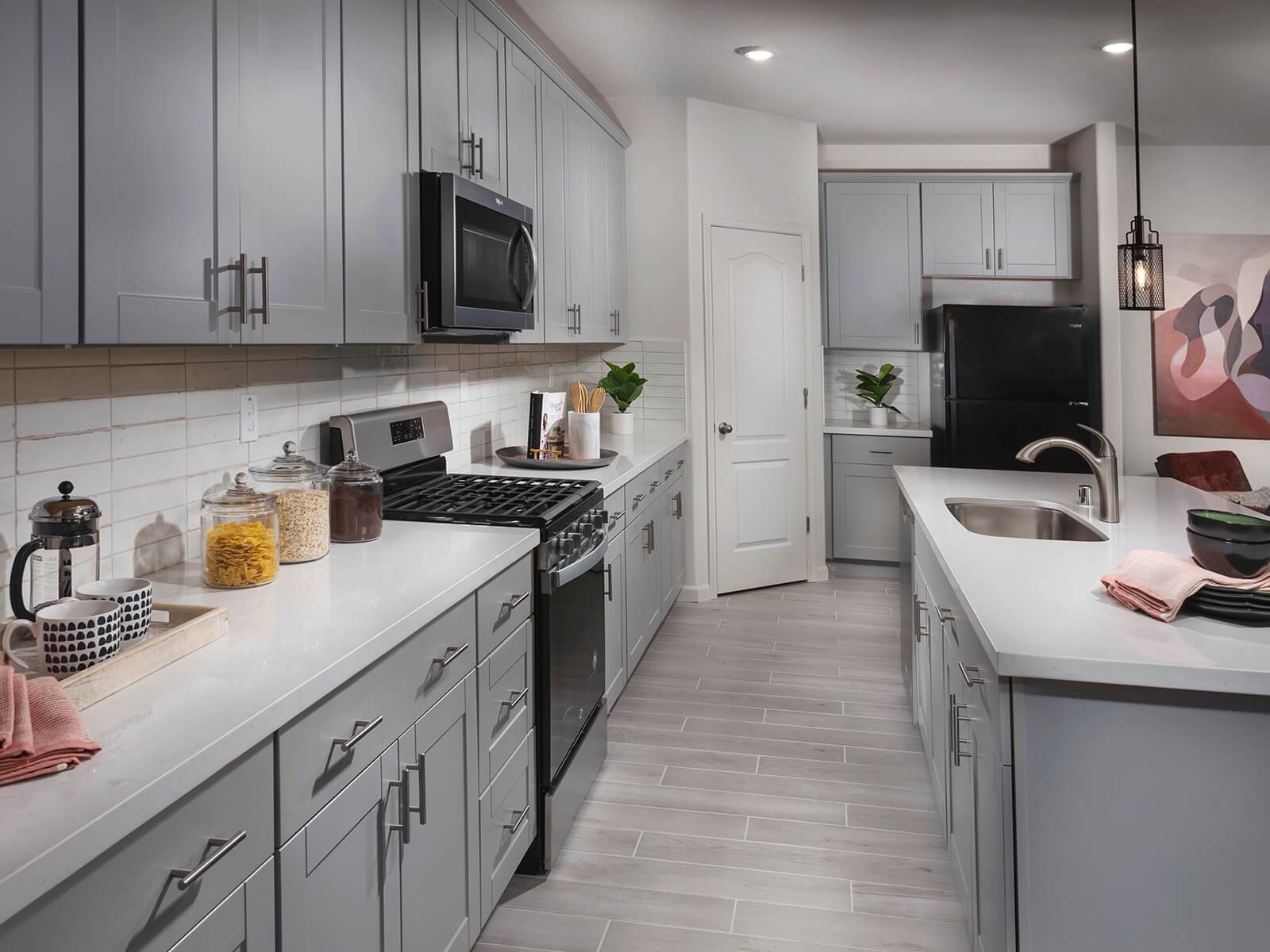 Residence 2 kitchen modeled at a nearby Meritage community.