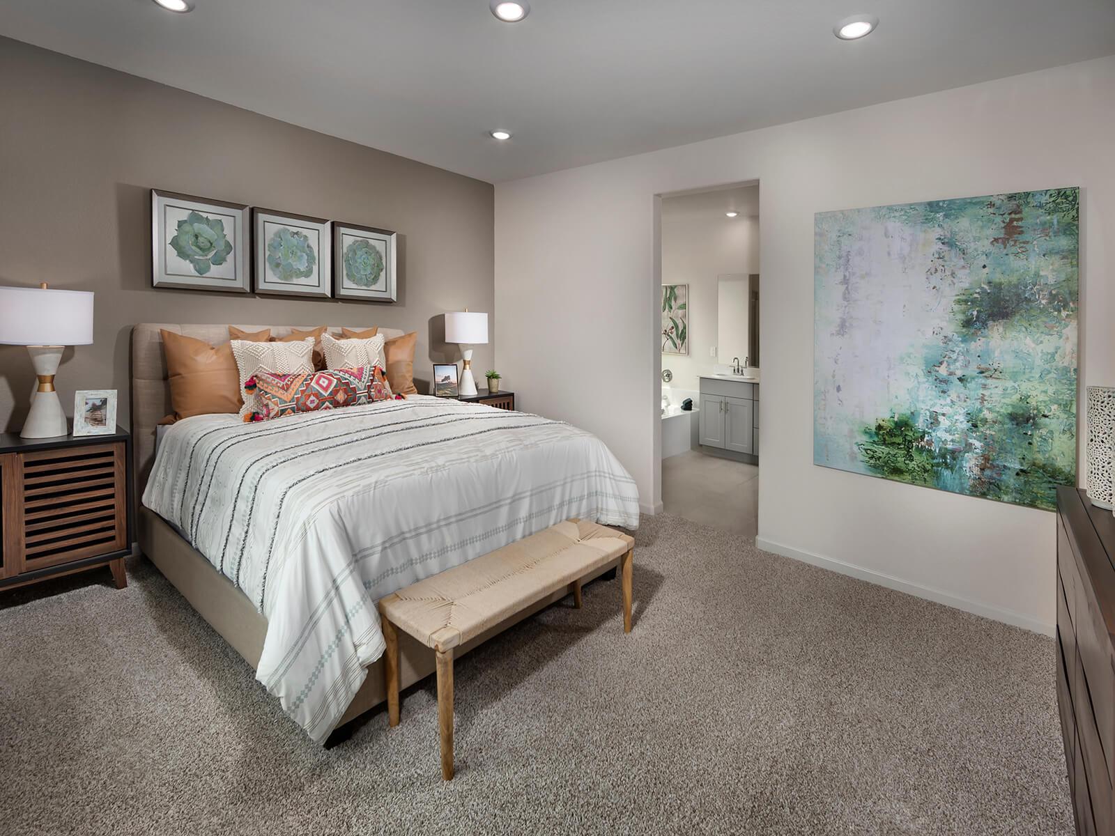 Residence 2 primary suite modeled at a nearby Meritage community.