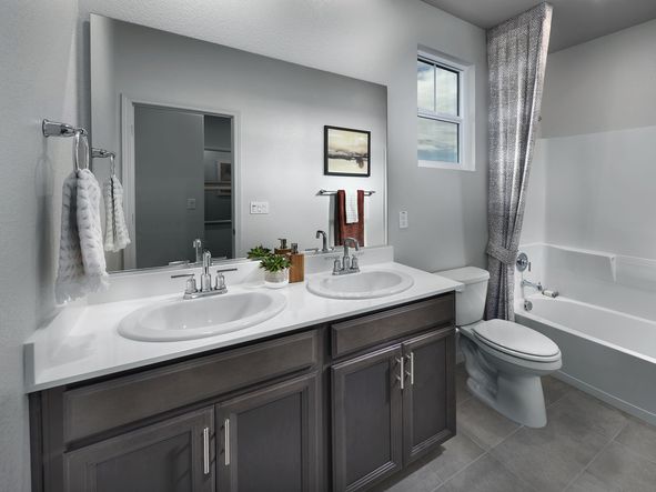 Get the kids ready for school in the beautiful secondary bathroom.