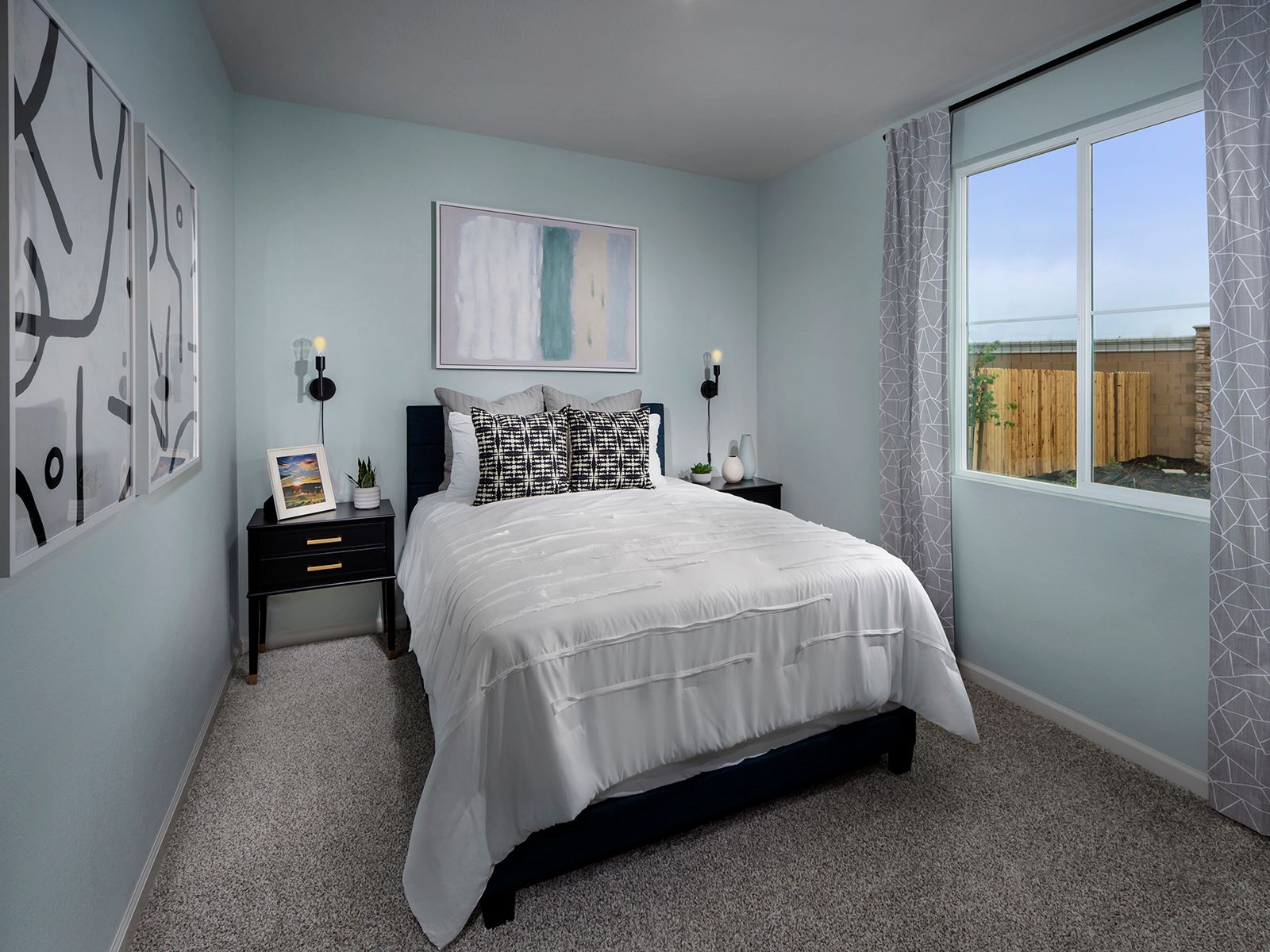 Residence 1 floorplan modeled at a nearby Meritage community.