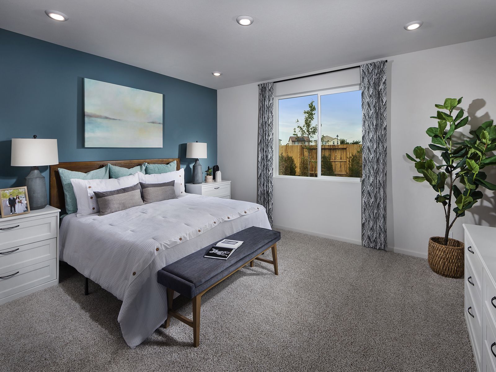 Residence 2 primary bedroom modeled at a nearby Meritage community.