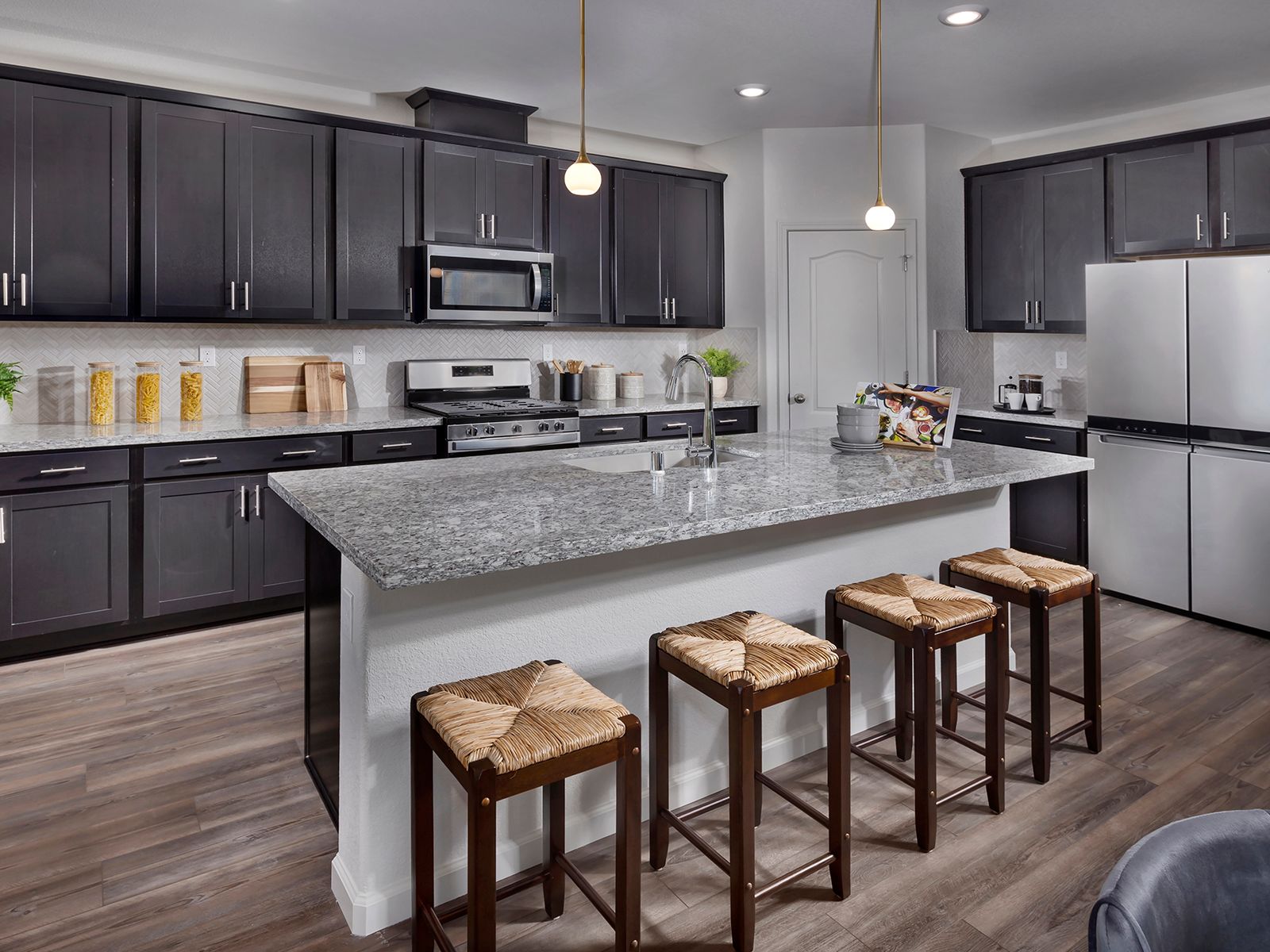 Residence 4 kitchen modeled at a nearby Meritage community.