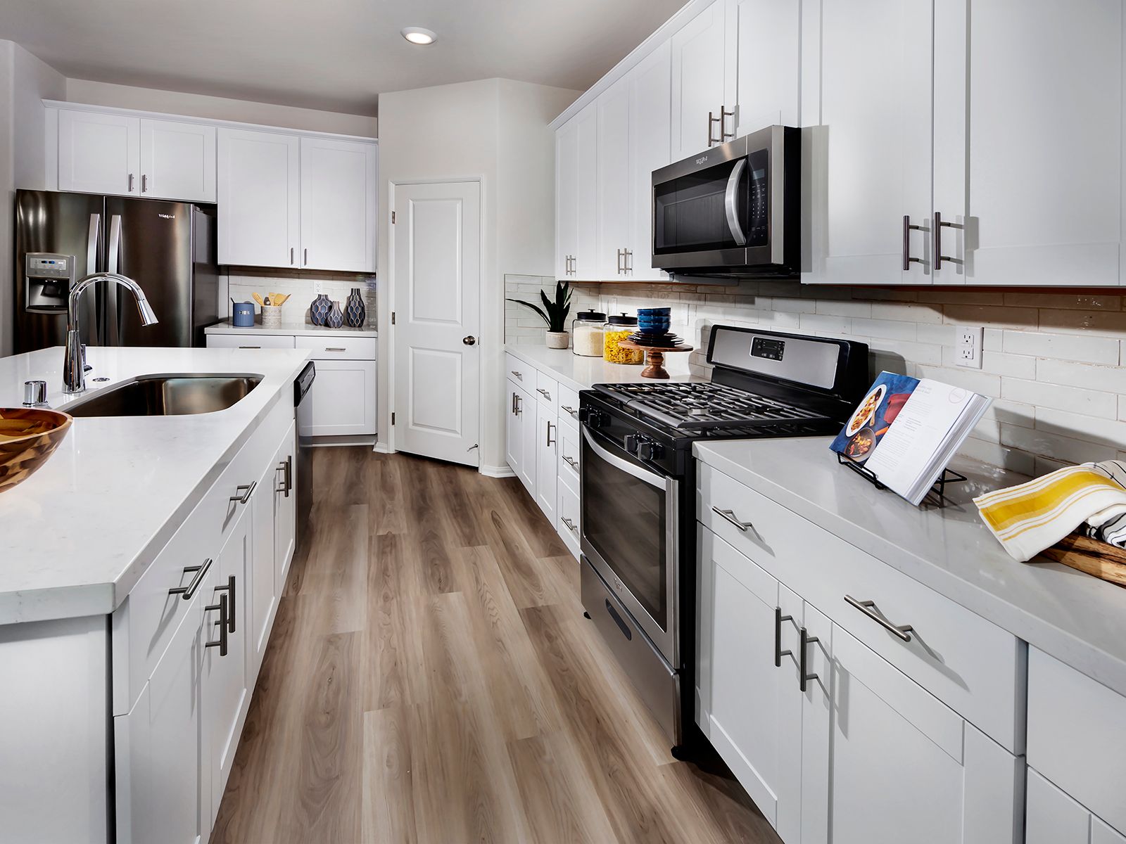 Residence 2 kitchen modeled at a nearby Meritage community.