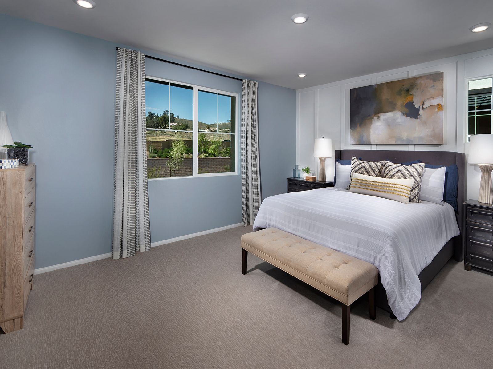 Residence 2 primary suite modeled at a nearby Meritage community.