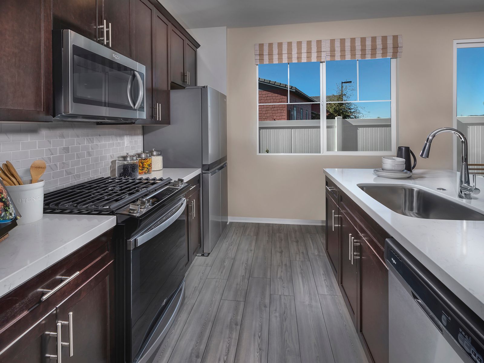 Residence 3 kitchen modeled at a nearby Meritage community.
