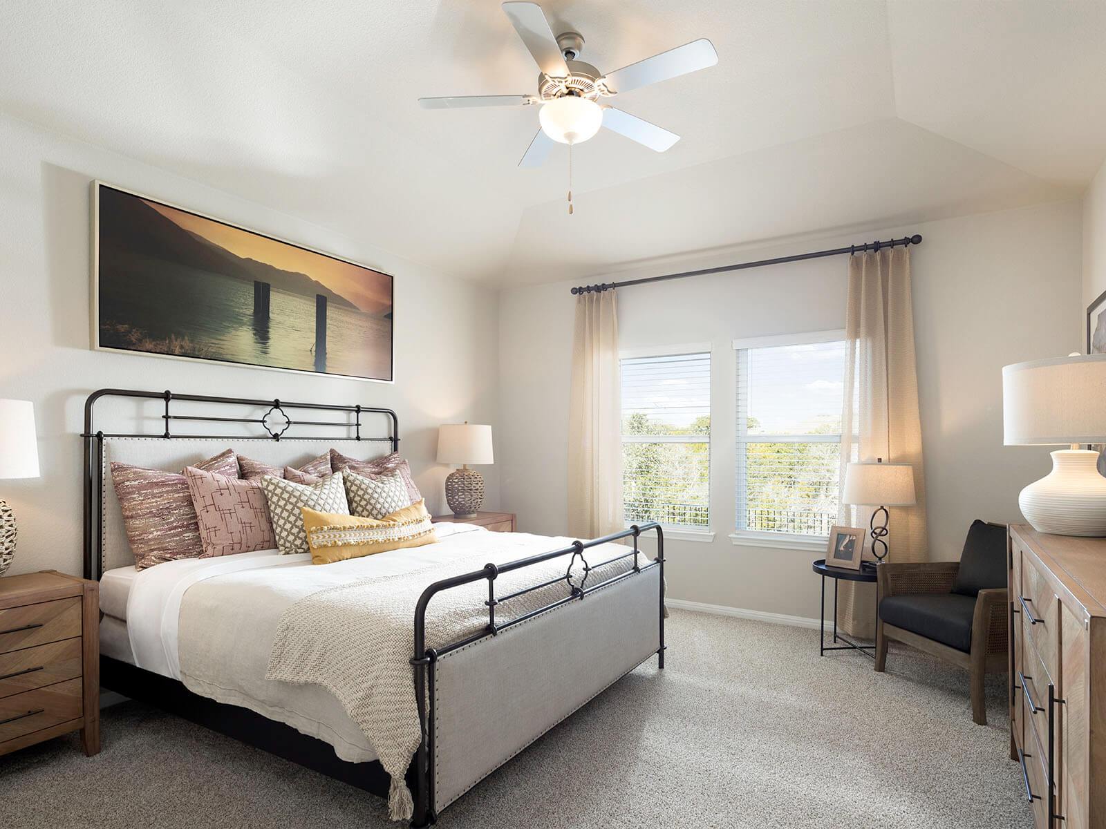 Enjoy a private primary suite tucked away in the back of the home.