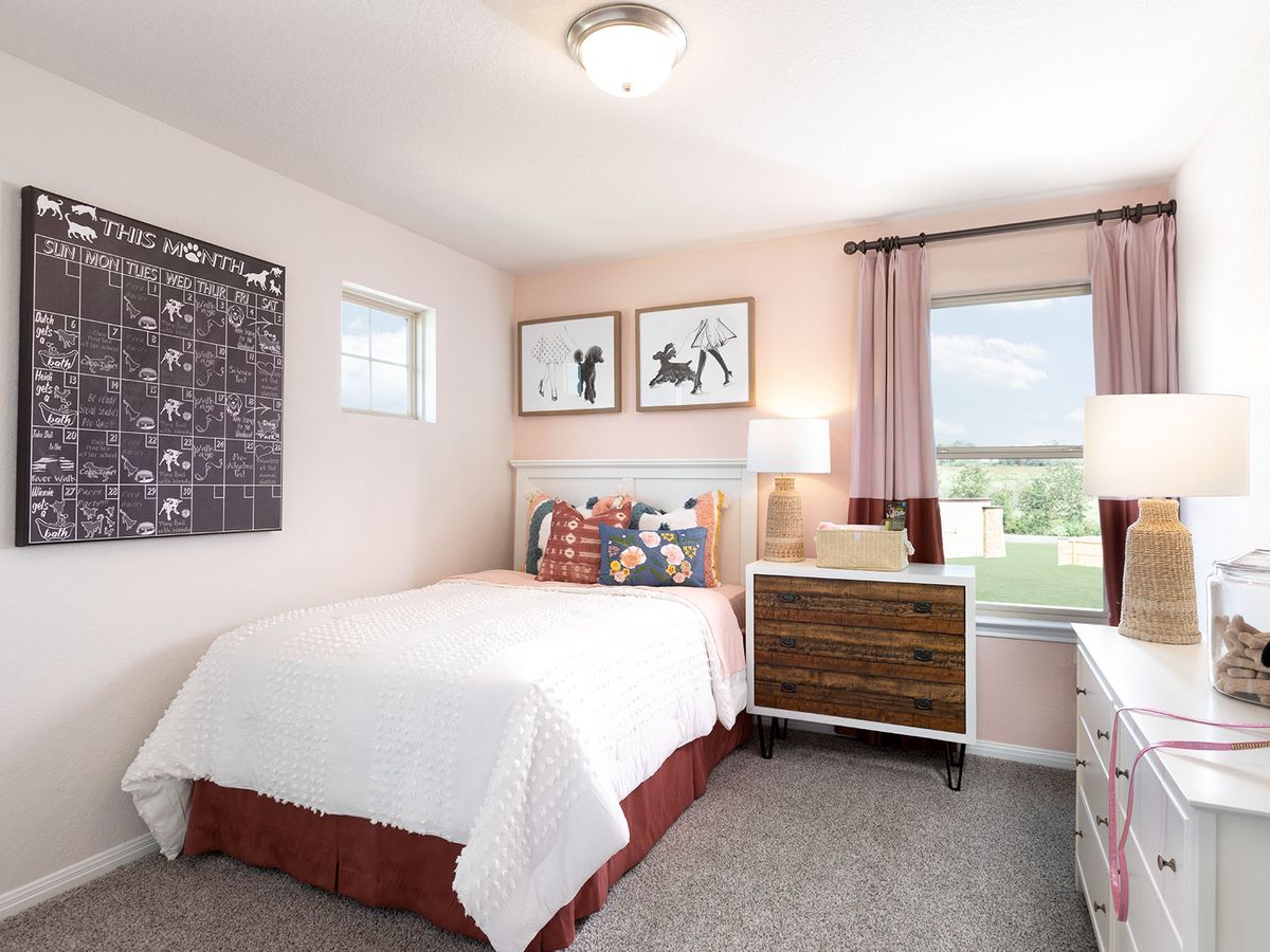 Spacious secondary bedrooms provide plenty of room for guests.