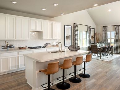 Cook delicious meals in the gourmet kitchen.