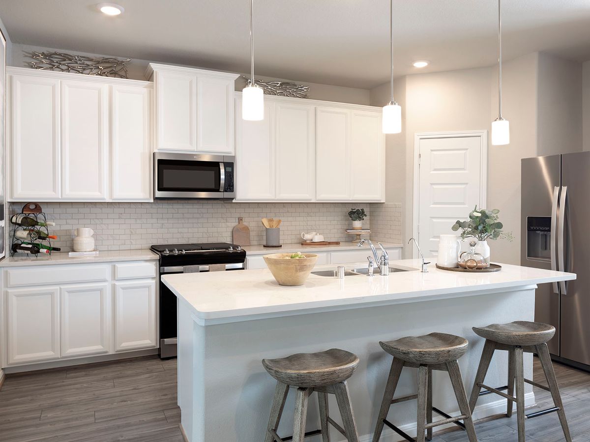 Cook meals as a family in your spacious kitchen.
