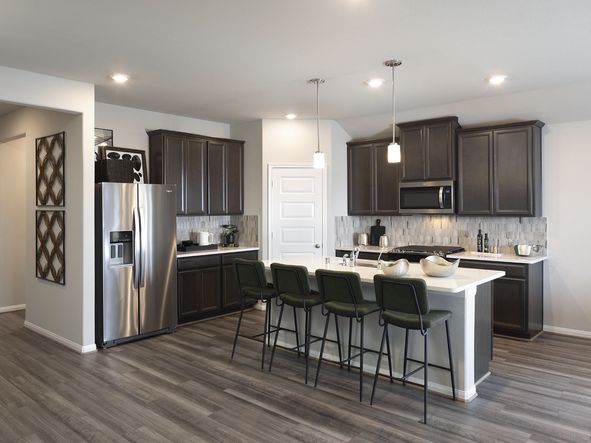Cook meals as a family in your spacious kitchen.