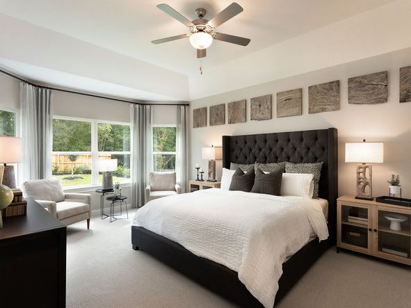 Relax in your cozy primary bedroom.