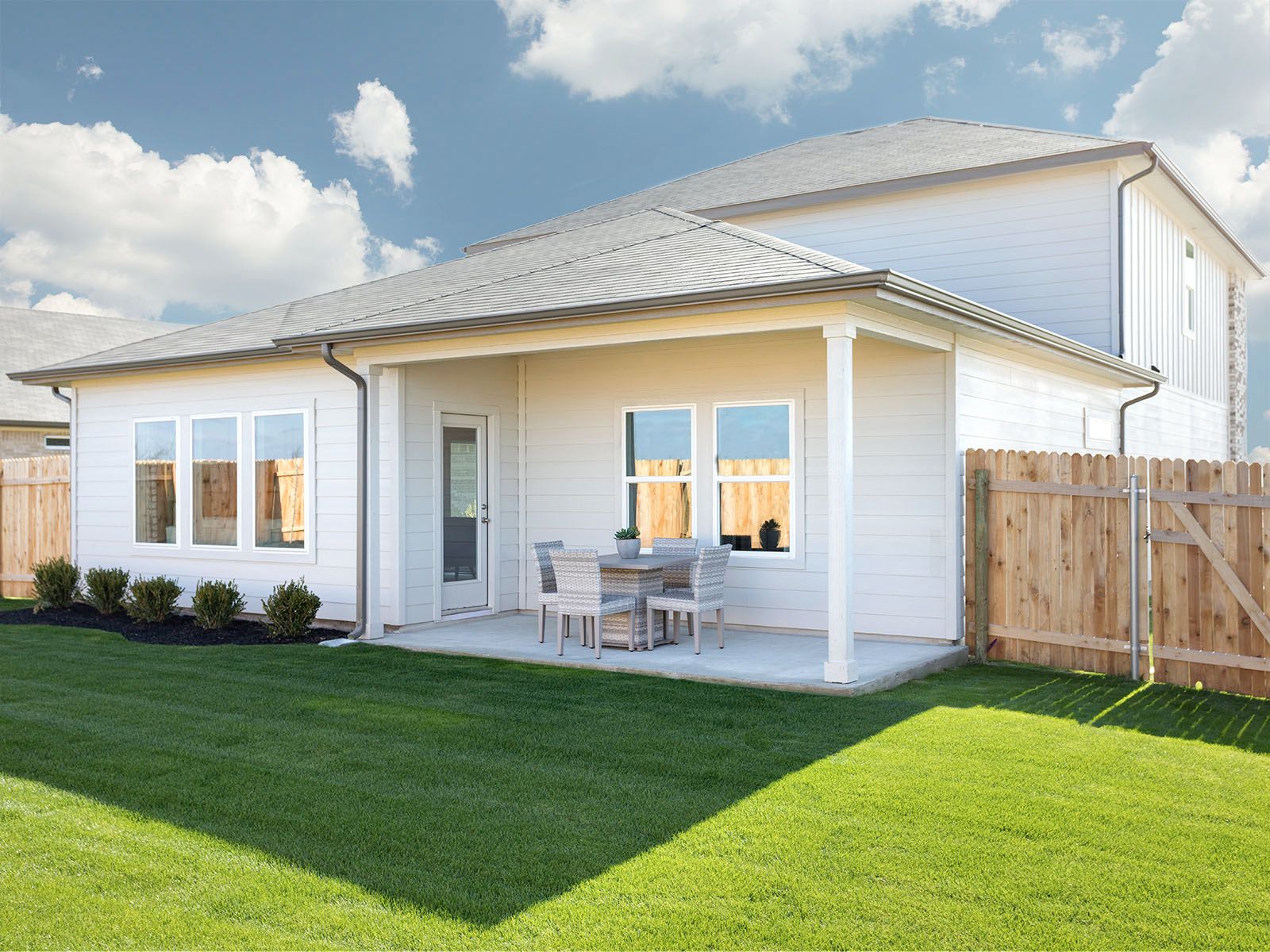 Relax or entertain on the covered back patio.