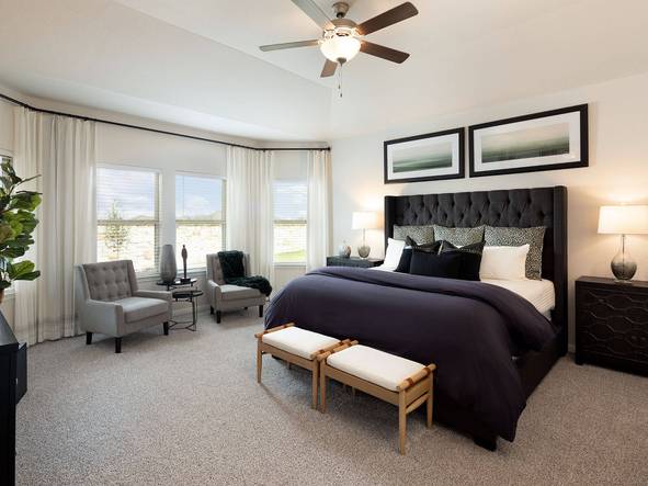 Sleep will come easy in this tranquil primary suite.