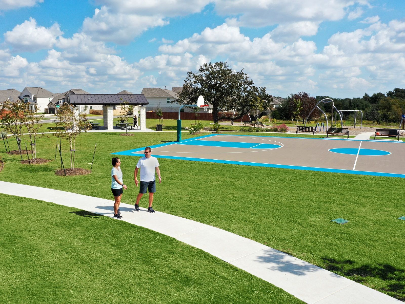 Neighborhood kids can gather and play at the basketball court.