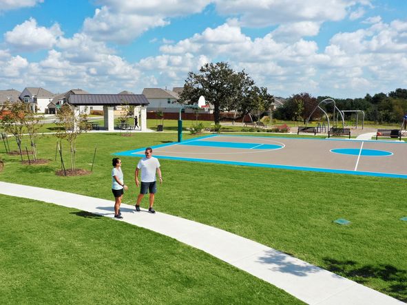 Neighborhood kids can gather and play at the basketball court.