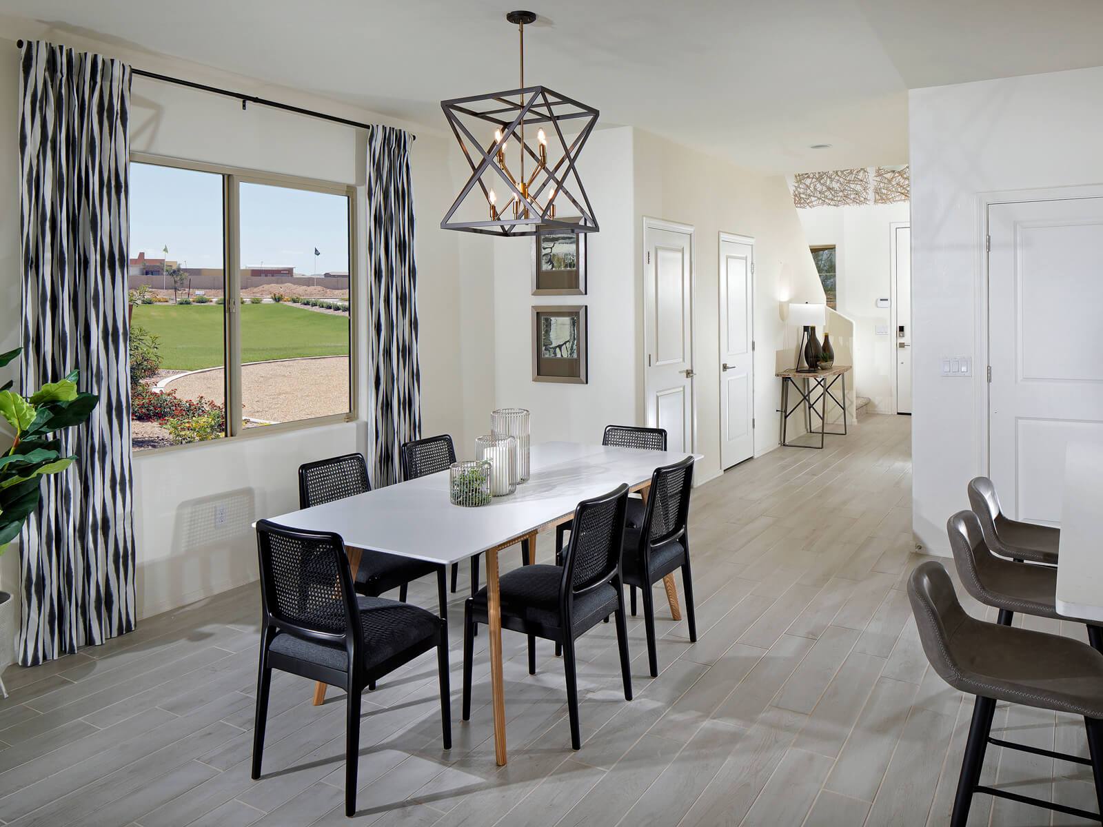 Entertain guests from the kitchen in the open concept dining area.