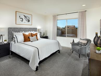 Unwind at the end of the day in the downstairs primary suite.