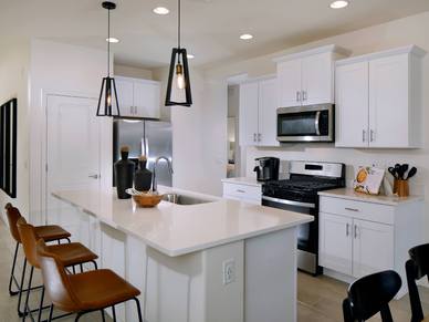 The 1320 floorplan modeled at Chaparral at Rancho Marana in Marana, AZ.