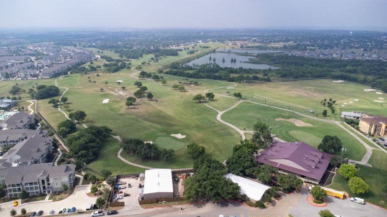 Enjoy a round of golf at Plum Creek Golf Course, right around the corner.