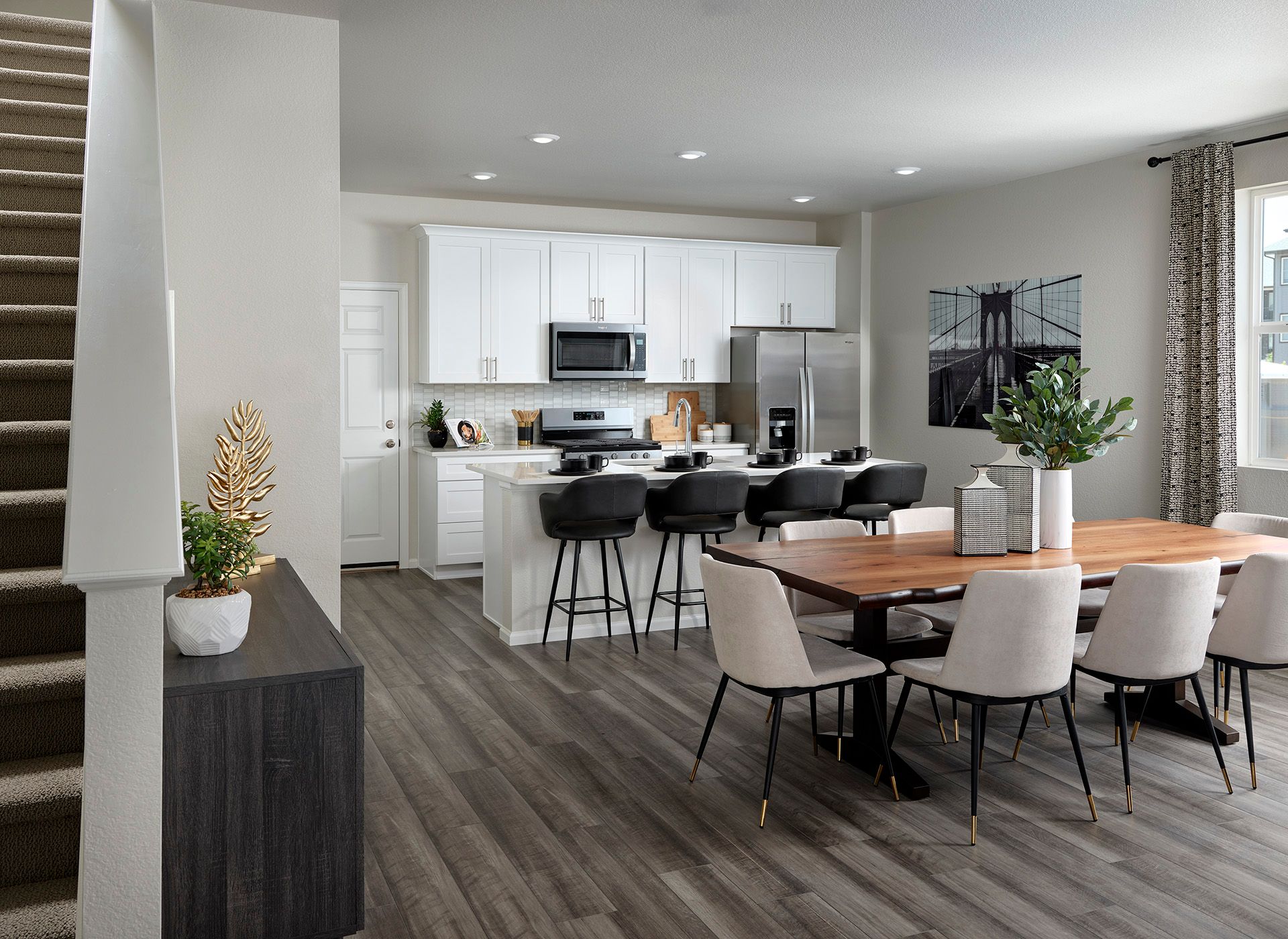 Welcome to the Woodland floorplan modeled ay Horizon Uptown in Aurora, CO.