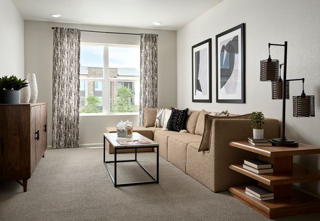 Welcome to the Woodland floorplan modeled ay Horizon Uptown in Aurora, CO.
