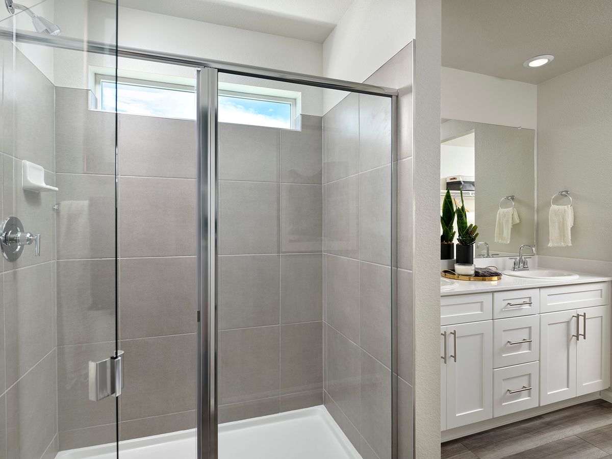 Welcome to the Woodland floorplan modeled ay Horizon Uptown in Aurora, CO.