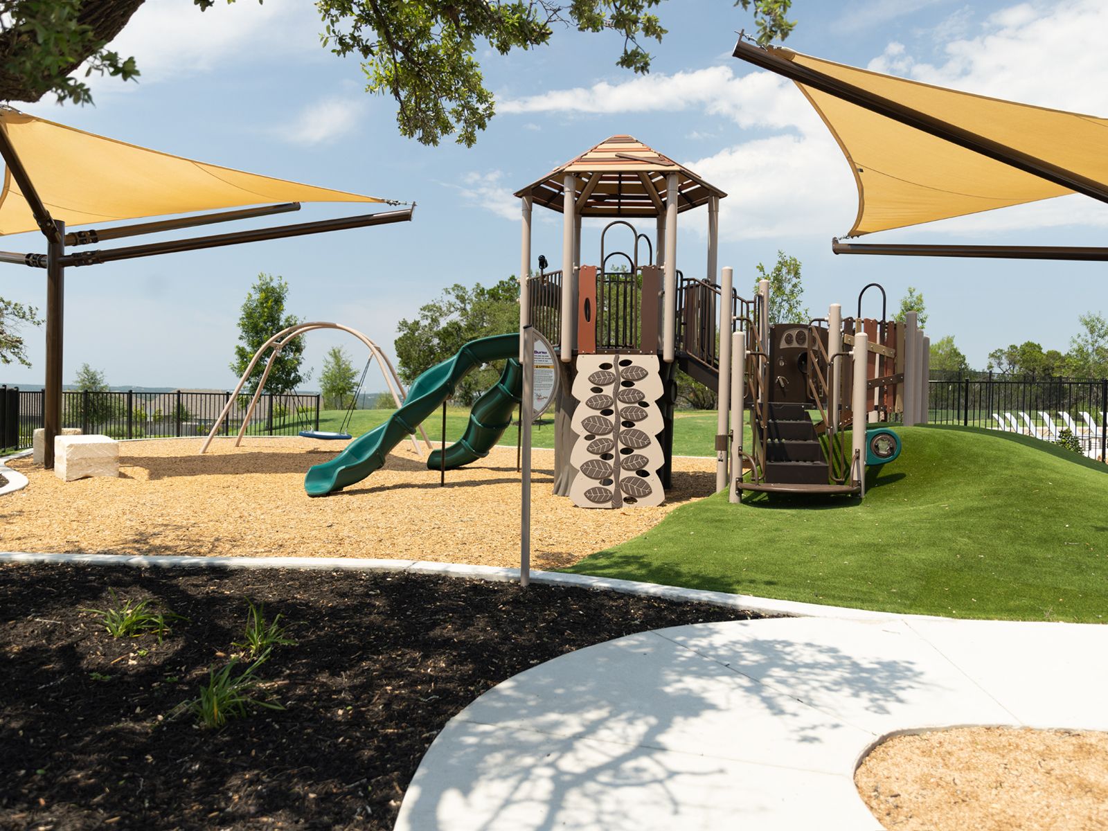 Kids will love the playground, equipped with shade cover.