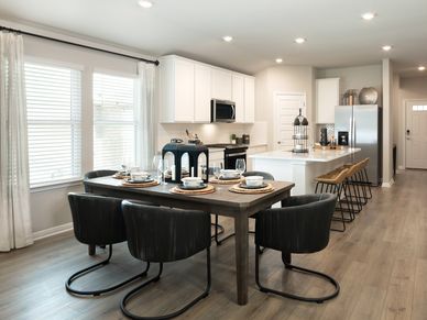 This floorplan features modern open-concept living and dining spaces.